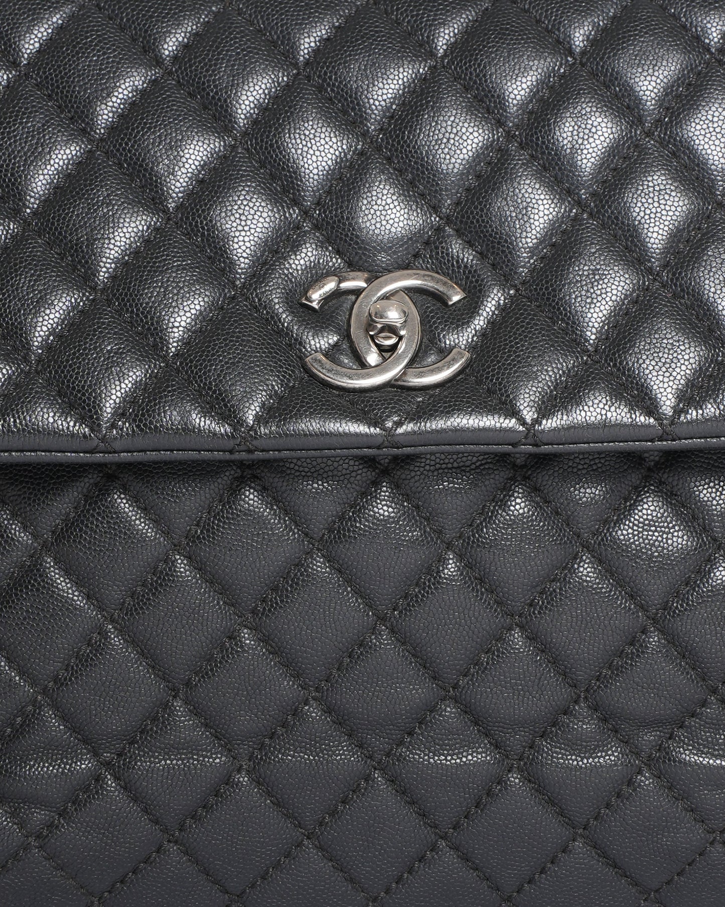 Chanel Quilted Caviar Coco Handle Bag in Black