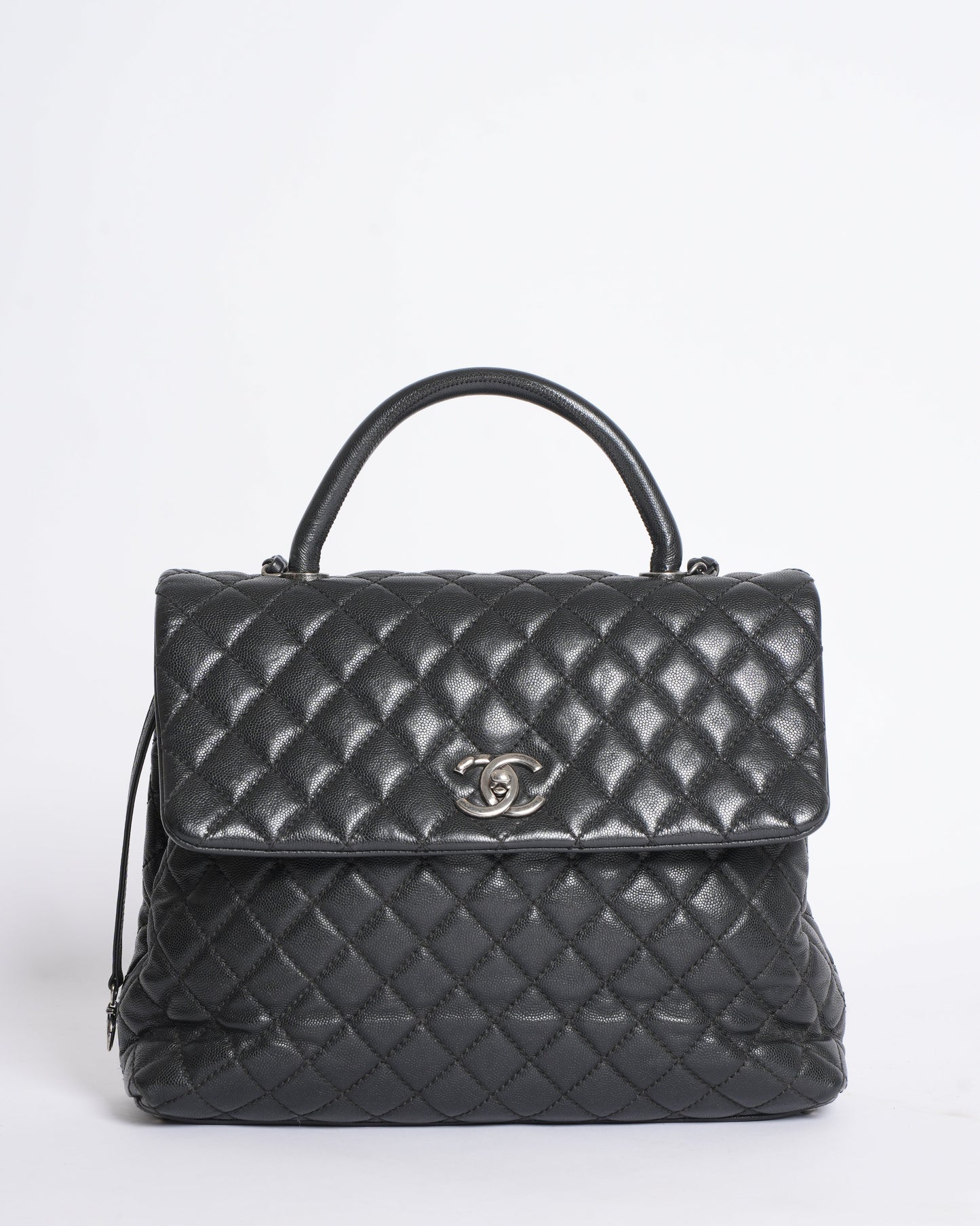 Chanel Quilted Caviar Coco Handle Bag in Black