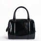 Christian dior boston bag in black monogram patent leather