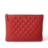 CHANEL QUILTED CAVIAR O CLUTCH BAG
