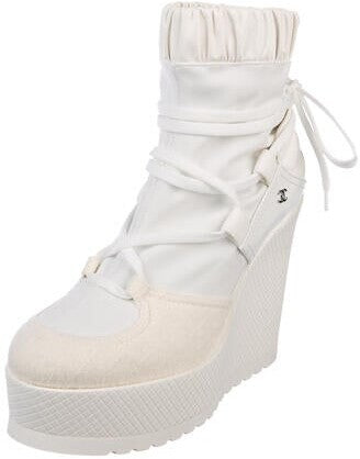 CHANEL INTERLOCKING CC LOGO LACE UP BOOTS