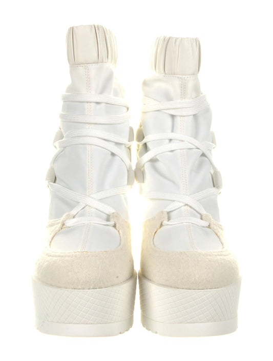CHANEL INTERLOCKING CC LOGO LACE UP BOOTS
