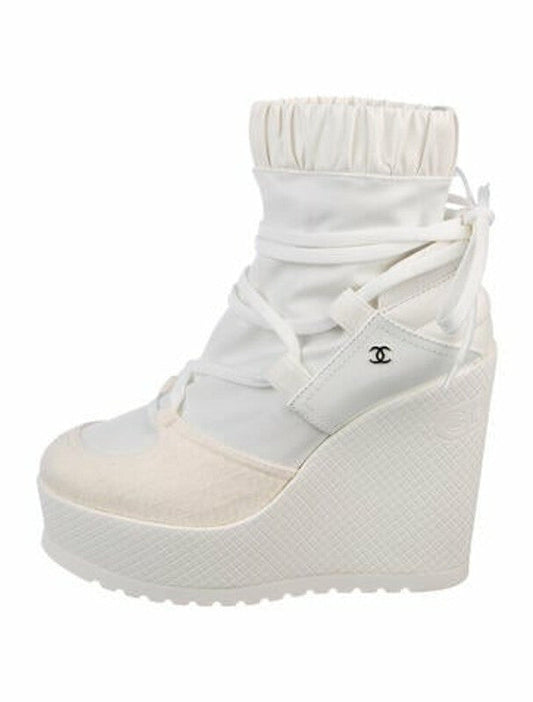 CHANEL INTERLOCKING CC LOGO LACE UP BOOTS