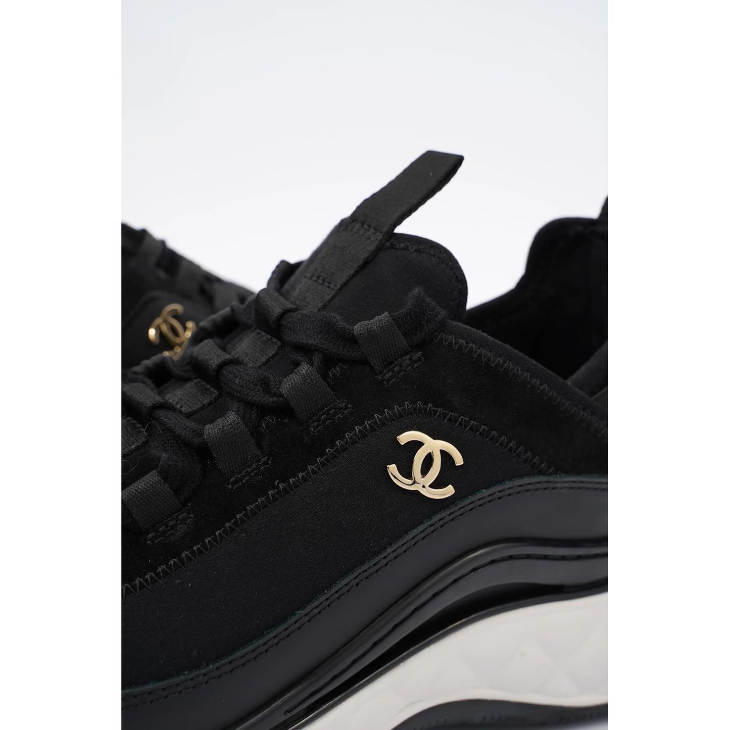 CHANEL QUILTED CC TRAINER SNEAKERS