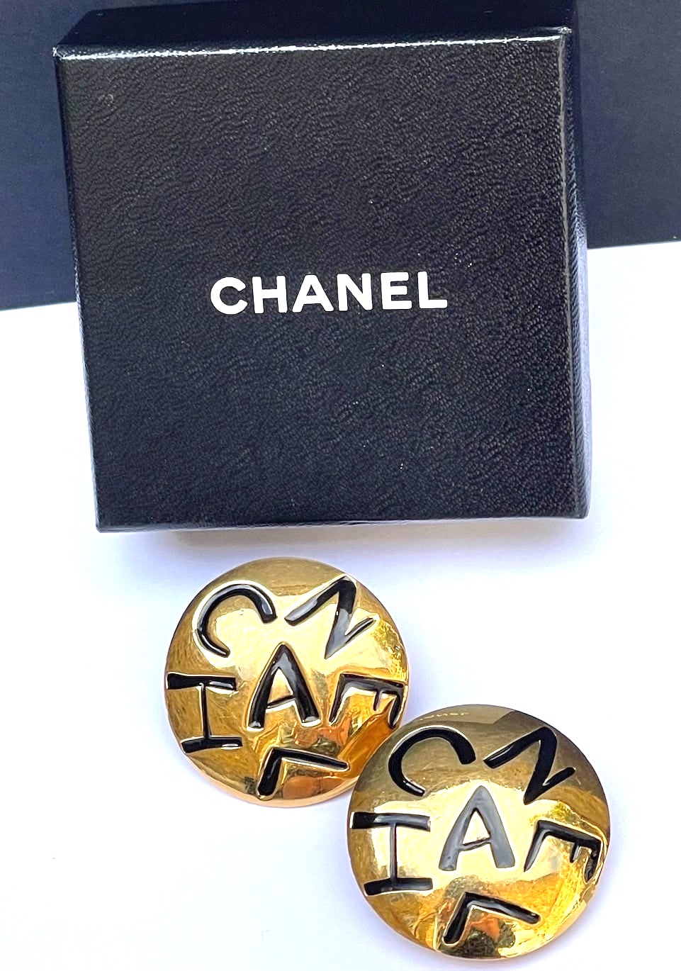 CHANEL    LOGO ENGRAVED CLIP-ON EARRINGS
