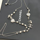 CHANEL TIMELESS CRYSTAL HEART PEARL LONG NECKLACE