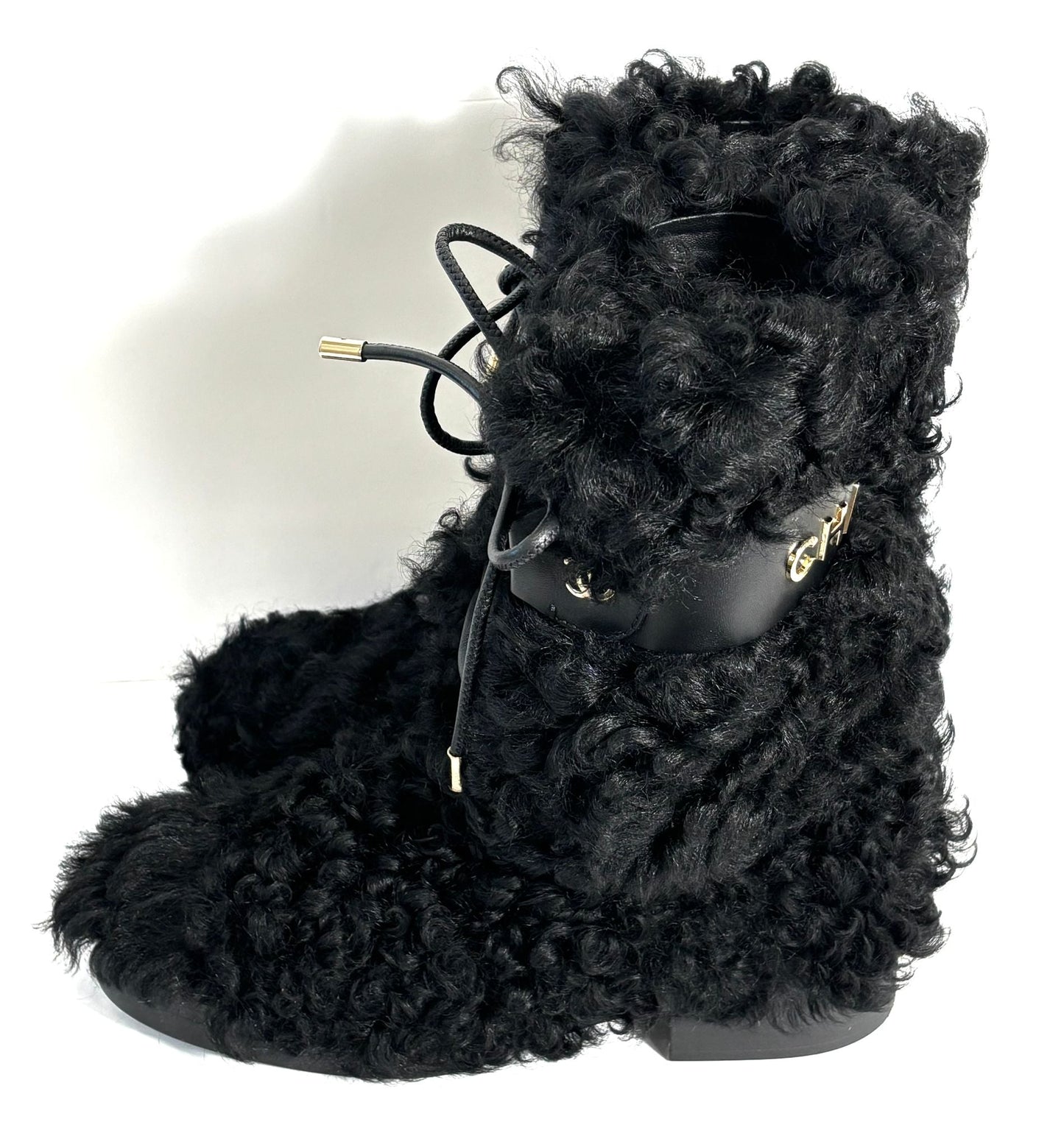 CHANEL INTERLOCKING CC LOGO SHEARLING BOOTS