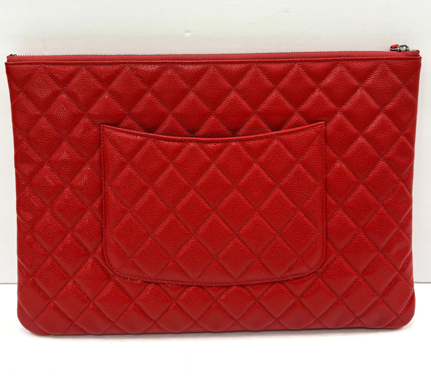 CHANEL QUILTED CAVIAR O CLUTCH BAG