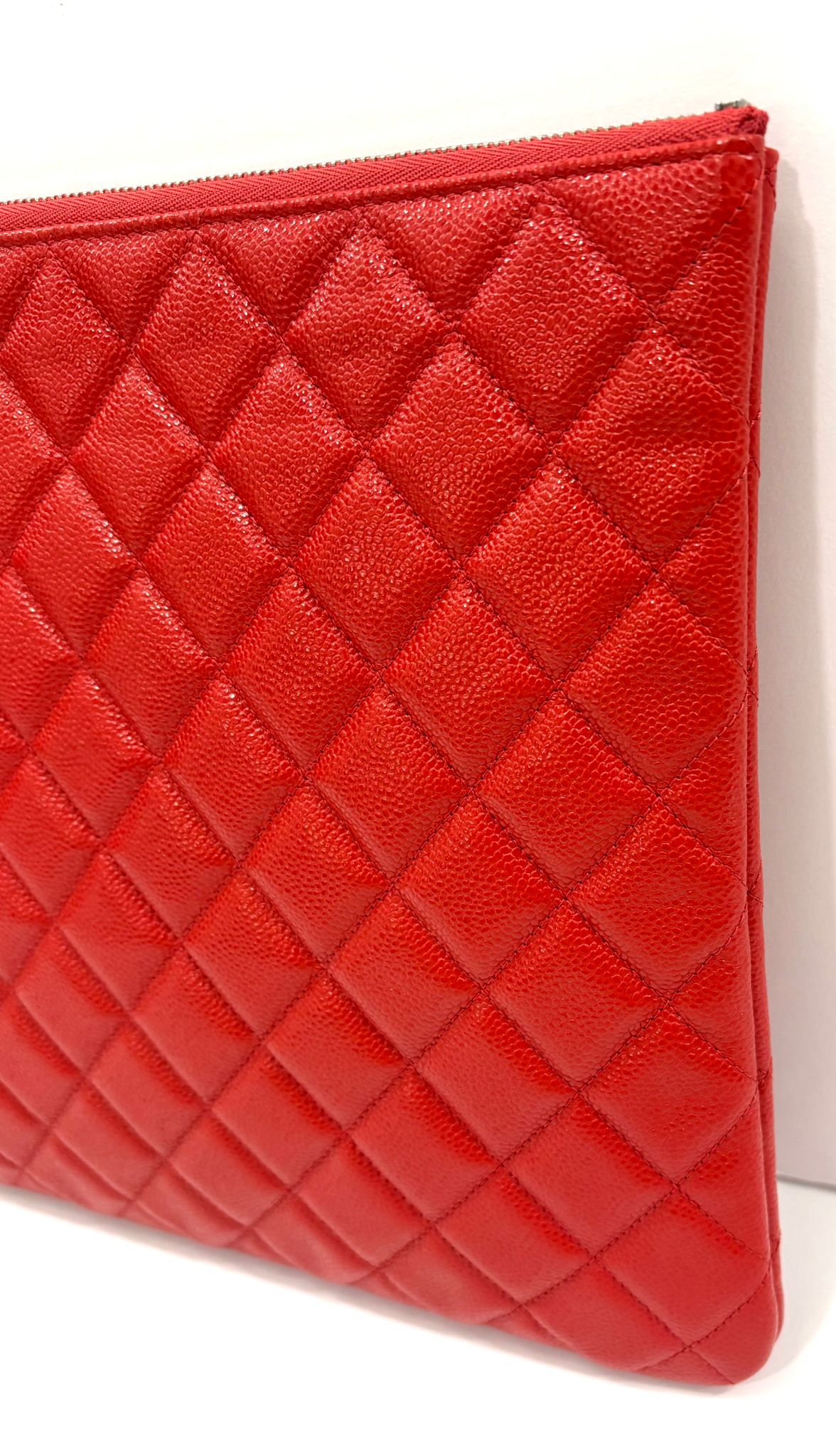 CHANEL QUILTED CAVIAR O CLUTCH BAG