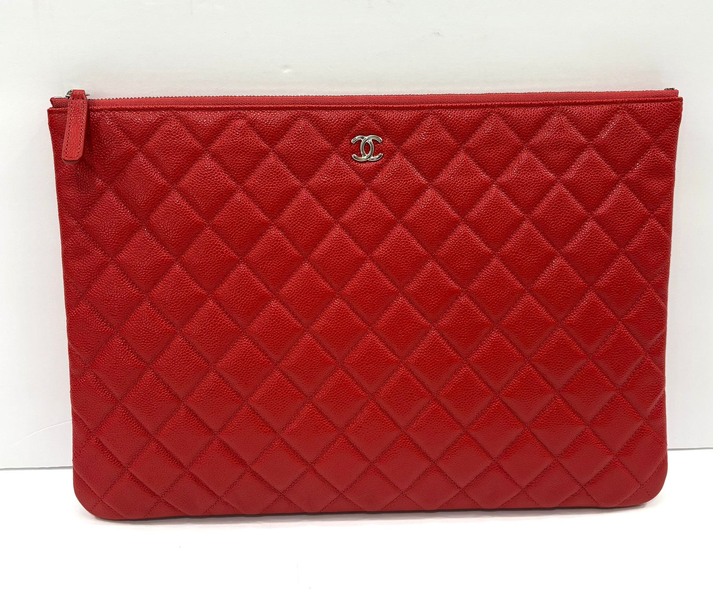 CHANEL QUILTED CAVIAR O CLUTCH BAG