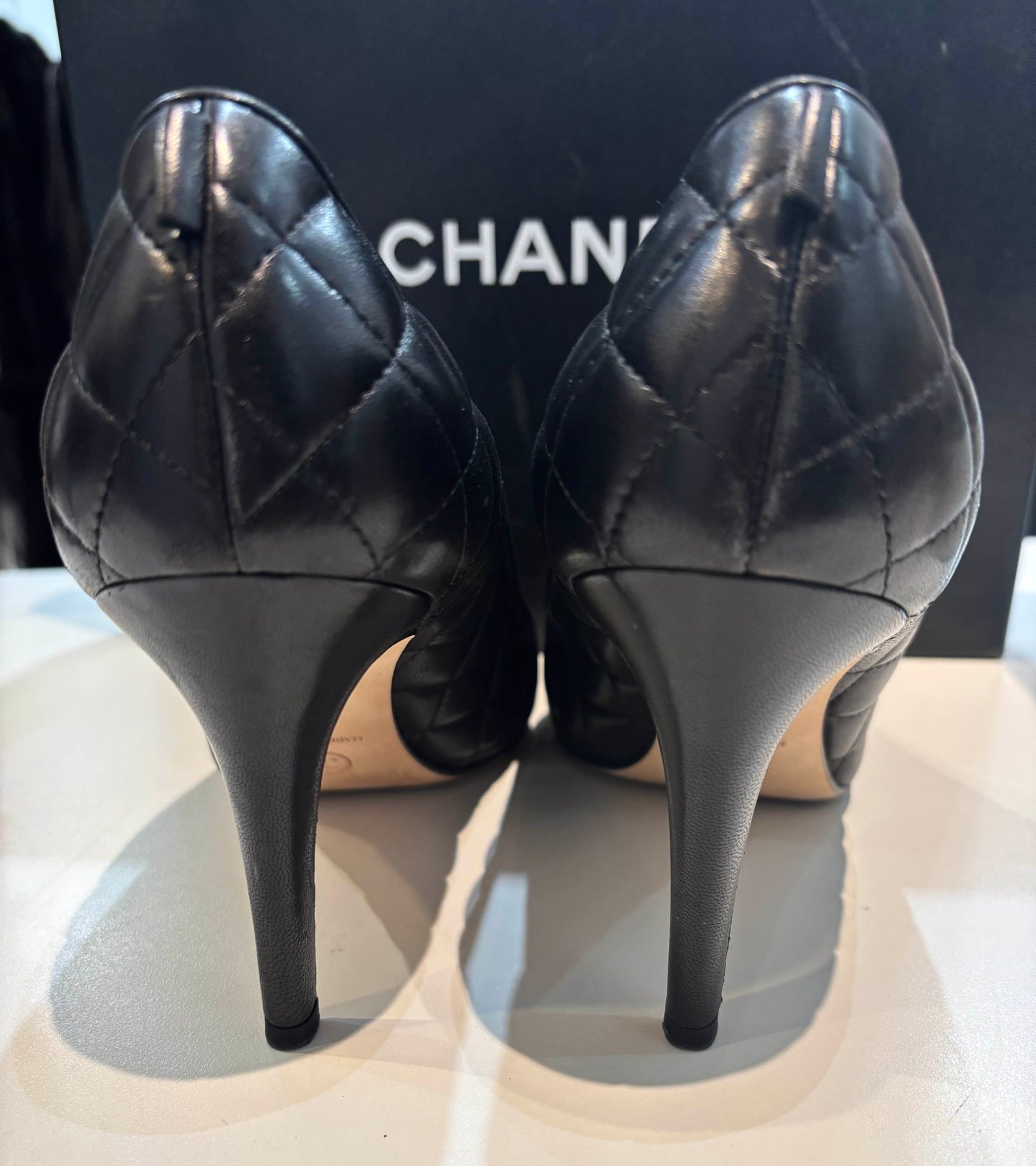 CHANEL CC QUILTED LAMBSKIN LEATHER PUMPS