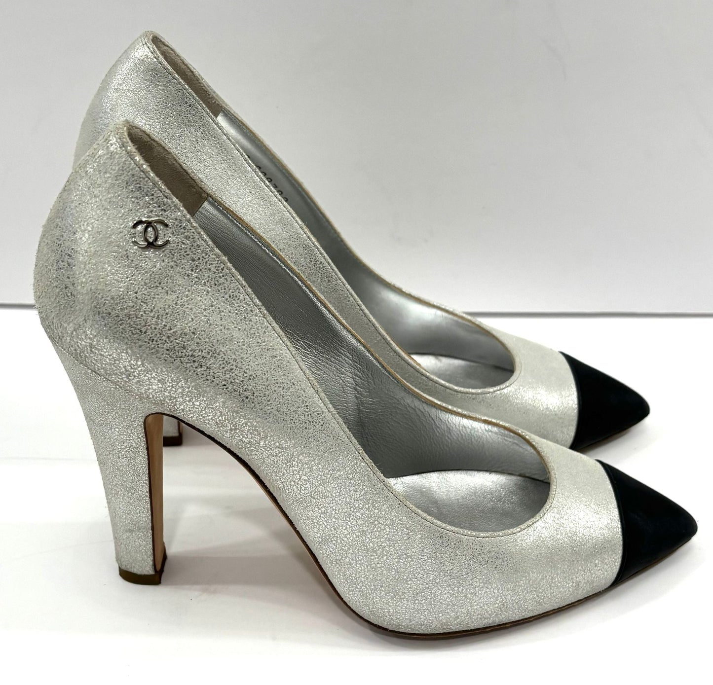 CHANEL METALLIC SILVER CC CAP TOE PUMPS