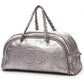 CHANEL LUXE LIGNE METALLIC SILVER LEATHER BOWLER BAG