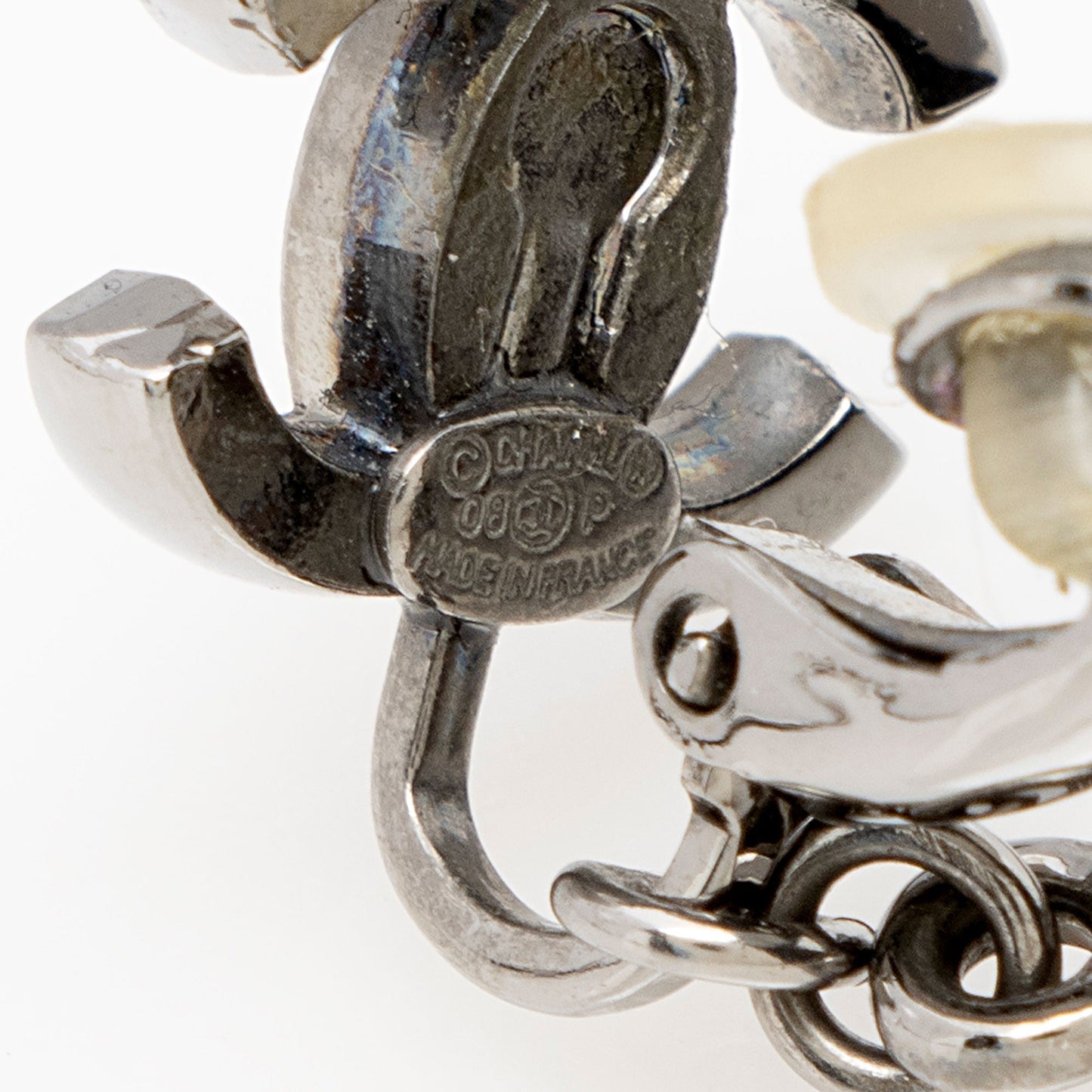 Chanel   Ruthenium Resin CC Star Drop Clip On Earrings