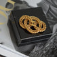CHANEL BROOCH
