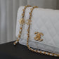 CHANEL WALLET ON CHAIN | CAMELLIA