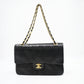 Chanel Medium Double Flap in Black Matelassé Leather