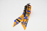 Hermes 'Panoplie Equestre' Twilly in Yellow and Blue Silk