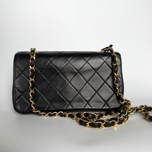 Chanel Classic Flap Mini   1989-1991 Black Lambskin Leather with 24k Gold Hardware