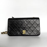 Chanel Classic Flap Mini   1989-1991 Black Lambskin Leather with 24k Gold Hardware