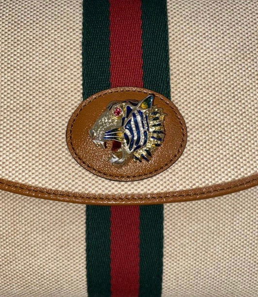 GCI ANIMALIER RAJHA CLUTCH BAG