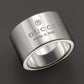 GUCCI STERLING SILVER GUCCI TRADEMARK WIDE BAND RING