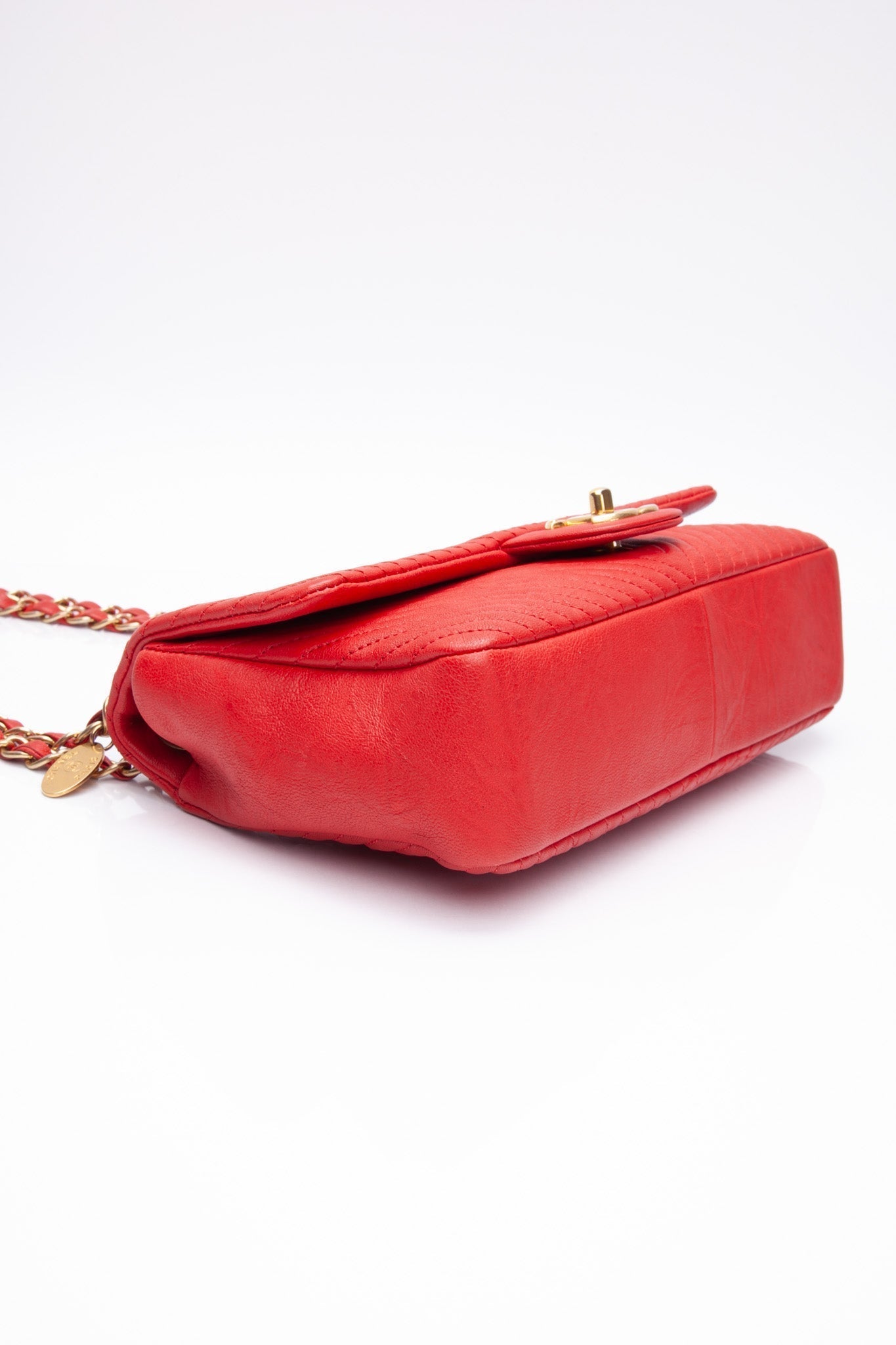 CHANEL Red Medallion Charm Chevron Wrinkled Calfskin Medium Flap Bag