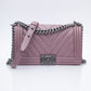 CHANEL Dark Pink Metallic Caviar Chevron Quilted Medium Boy Flap bag