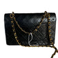 Chanel Classic Flap   Black Lambskin Leather with 24k Gold Hardware, 1986-1988