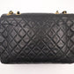 Chanel Maxi Flap in Black Matelassé Leather