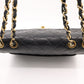 Chanel Maxi Flap in Black Matelassé Leather