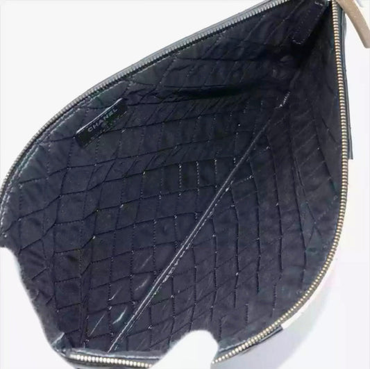 CHANEL Quilted Lambskin Large O-Case Pouch