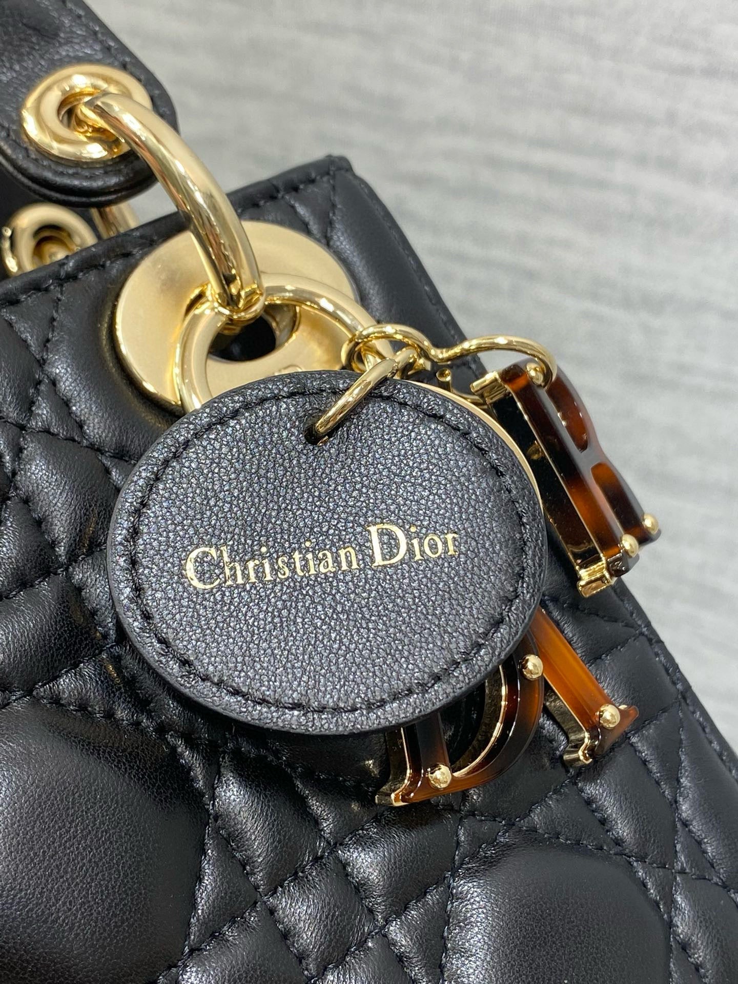 SMALL 20 LADY BAG IN BLACK MACROCANNAGE LAMBSKIN WITH GOLD HARDWARE Amelia