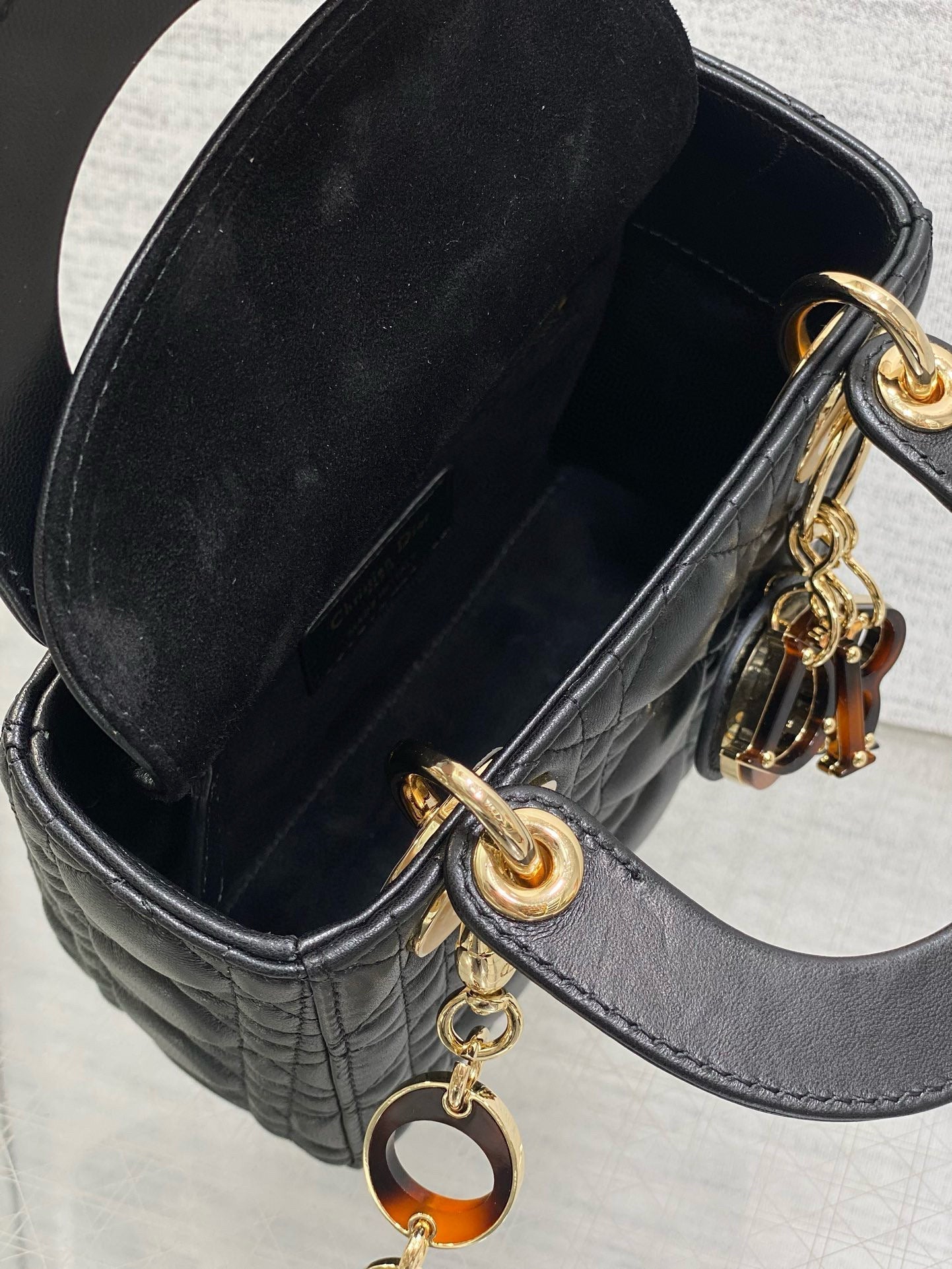 SMALL 20 LADY BAG IN BLACK MACROCANNAGE LAMBSKIN WITH GOLD HARDWARE Amelia