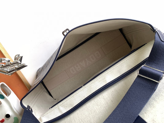 CAPETIEN MESSENGER BAG 39 IN NAVY BLUE GOYARDINE CANVAS AND CALFSKIN Amelia Bags