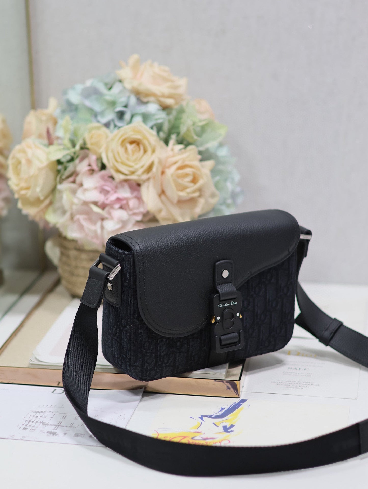 MEDIUM SADDLE MESSENGER BAG IN BLACK OBLIQUE JACQUARD AND BLACK GRAINED CALFSKIN Amelia