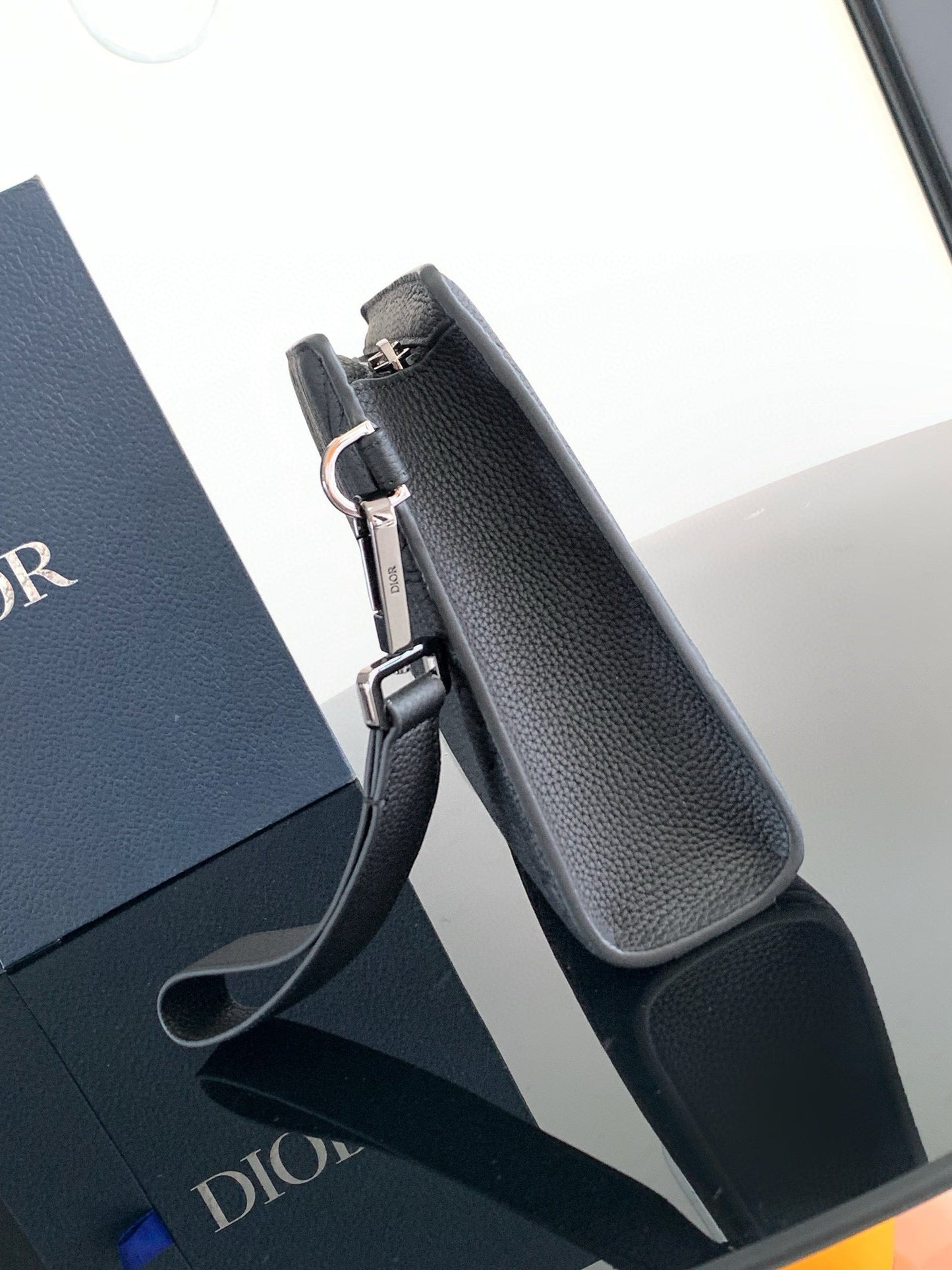 CLUTCH 27 BAG IN BLACK CALFSKIN EMBOSSED LOGO Amelia