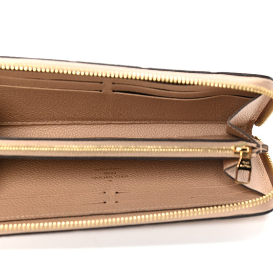 LU VI -  CLEMENCE MONOGRAM EMPREINTE LEATHER WALLET
