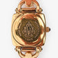 Gucci   Gold Tone Metal/Pink Lizard Embossed Strap Watch
