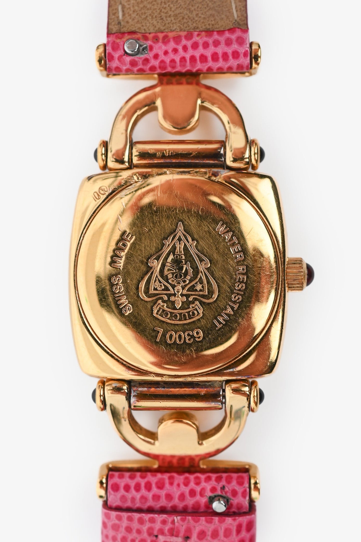 Gucci   Gold Tone Metal/Pink Lizard Embossed Strap Watch