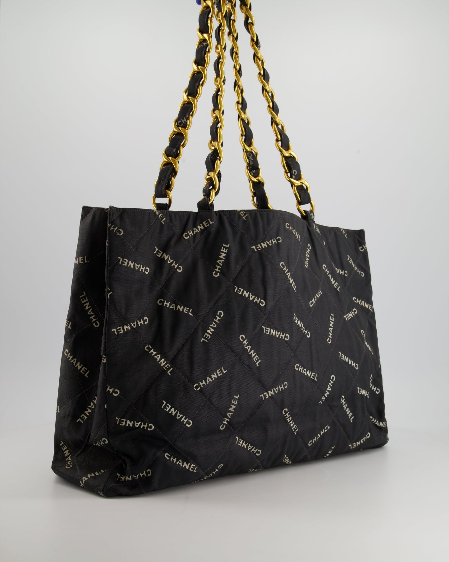 Chanel   Black Bag in Quilted Canvas Logo Print with Gold Hardware