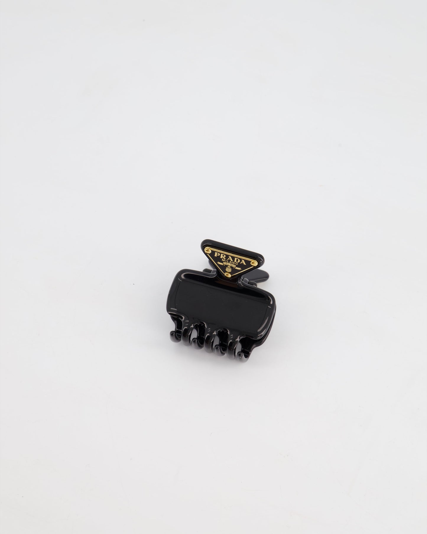Prada Black Enameled Metal Claw Hair Clip with Gold Triangle Logo Plaque