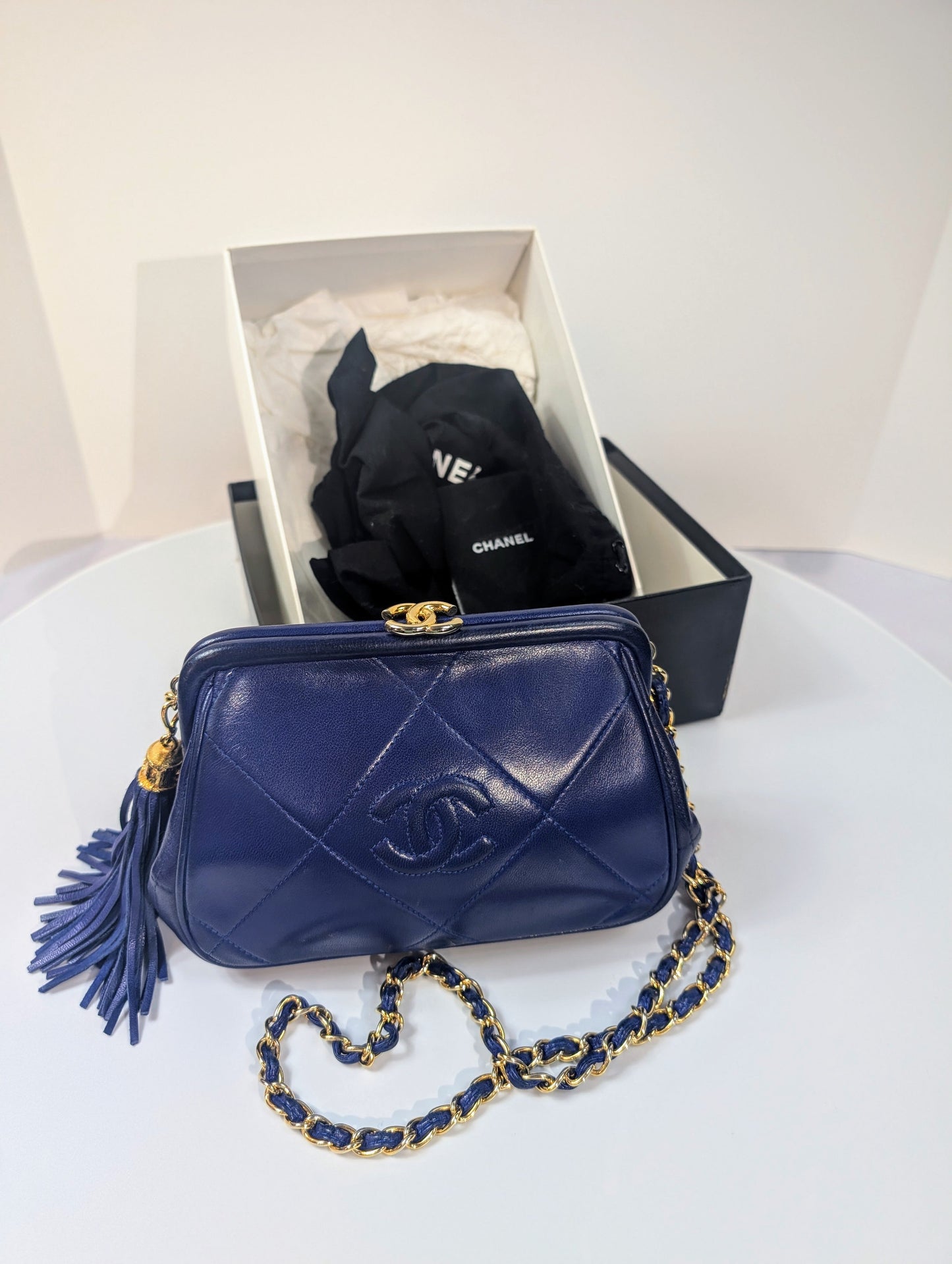 Chanel   Blue Quilted Lambskin Kisslock Tassel Clutch with Strap