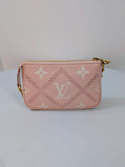 Louis Vuitton Pink Monogram Empreinte Mini Pochette Accessories Bag