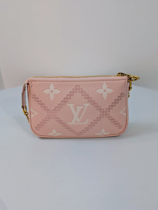 Louis Vuitton Pink Monogram Empreinte Mini Pochette Accessories Bag