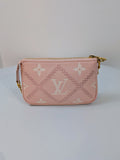 Louis Vuitton Pink Monogram Empreinte Mini Pochette Accessories Bag