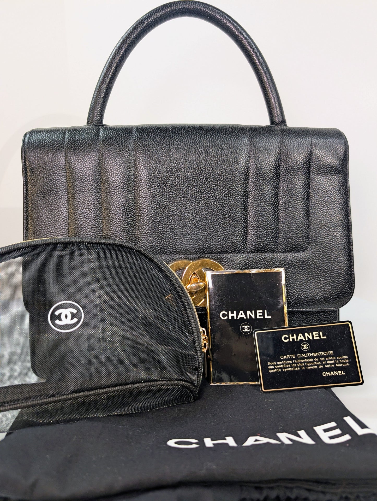 Chanel   Black Caviar Mademoiselle Kelly Top Handle Flap Bag