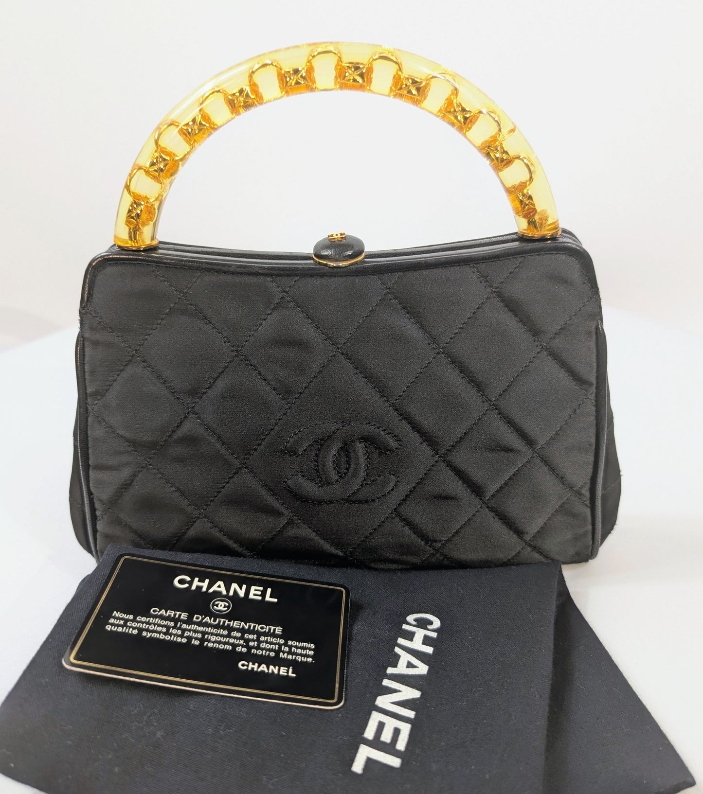 Chanel   Black Quilted Satin Frame Top Handle Bag