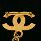 Broche dorée Chanel 1995