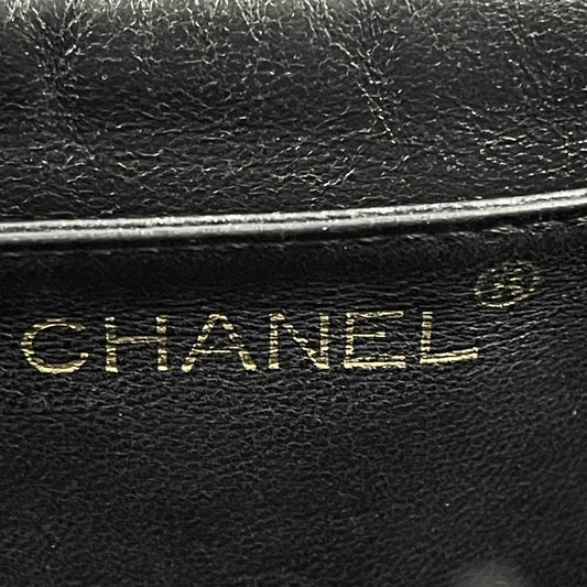 CHANEL   Large Quilted CC Caviar Kelly Flap Bag - Top Handle
